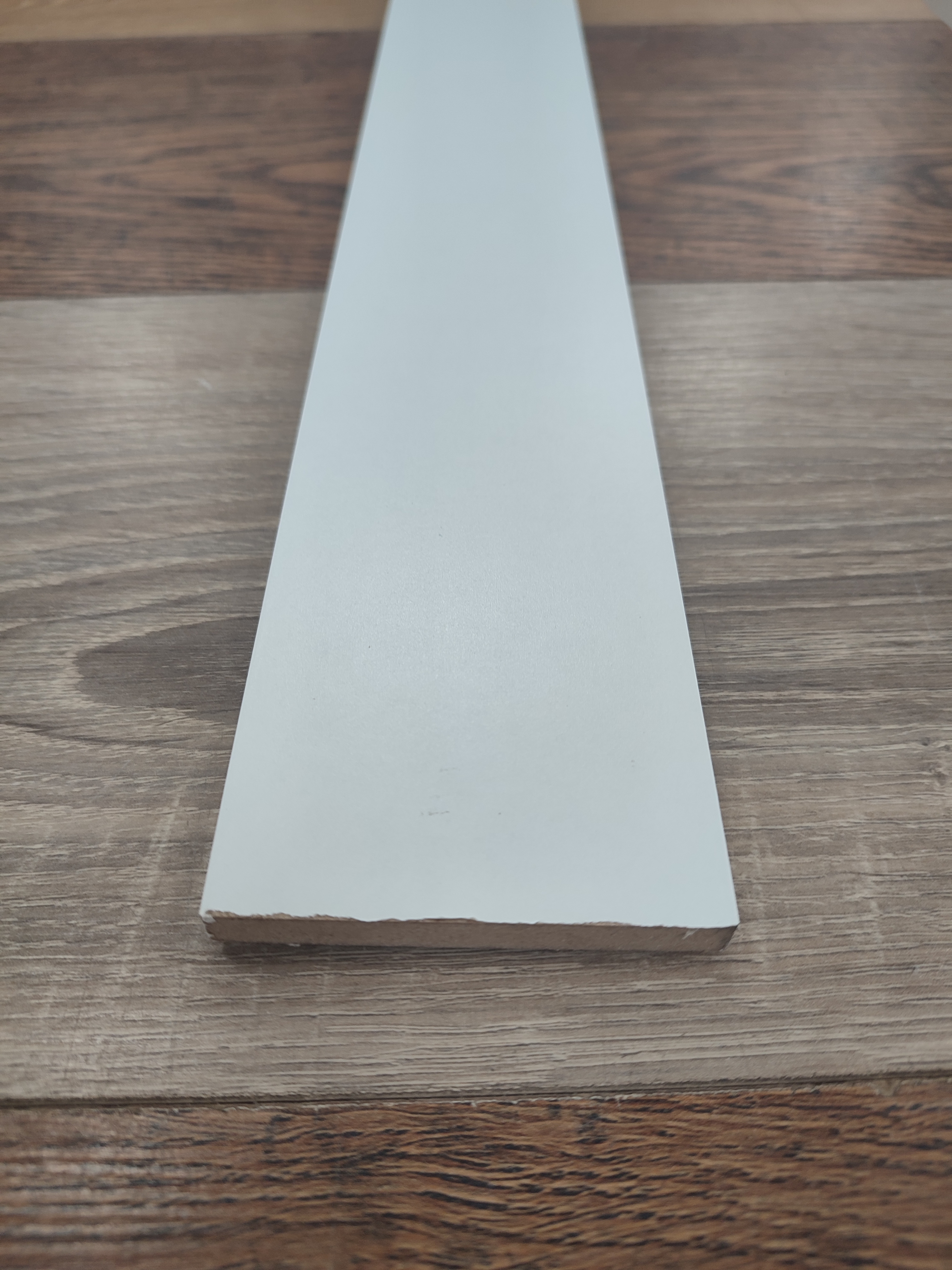 картинка Наличник МДФ Ламинатин белый 70*2150 мм от магазина Евродом