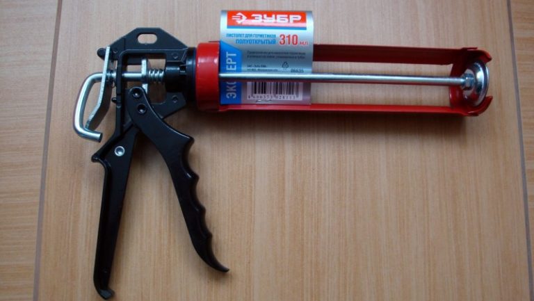 картинка Пистолет ЗУБР "ЭКСПЕРТ" для герметиков полуоткрытый ,310мл 06635 от магазина Евродом